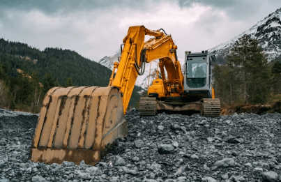 Construction excavator on a fiber utility job site